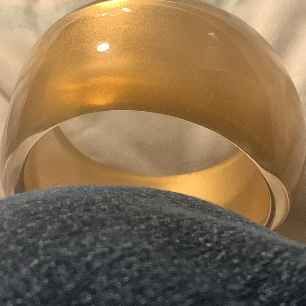 Lucite looking bangle bracelet but not sure amber type color
